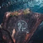 Wooden dock symbolizes stability, akin to Masonic symbols' foundation.