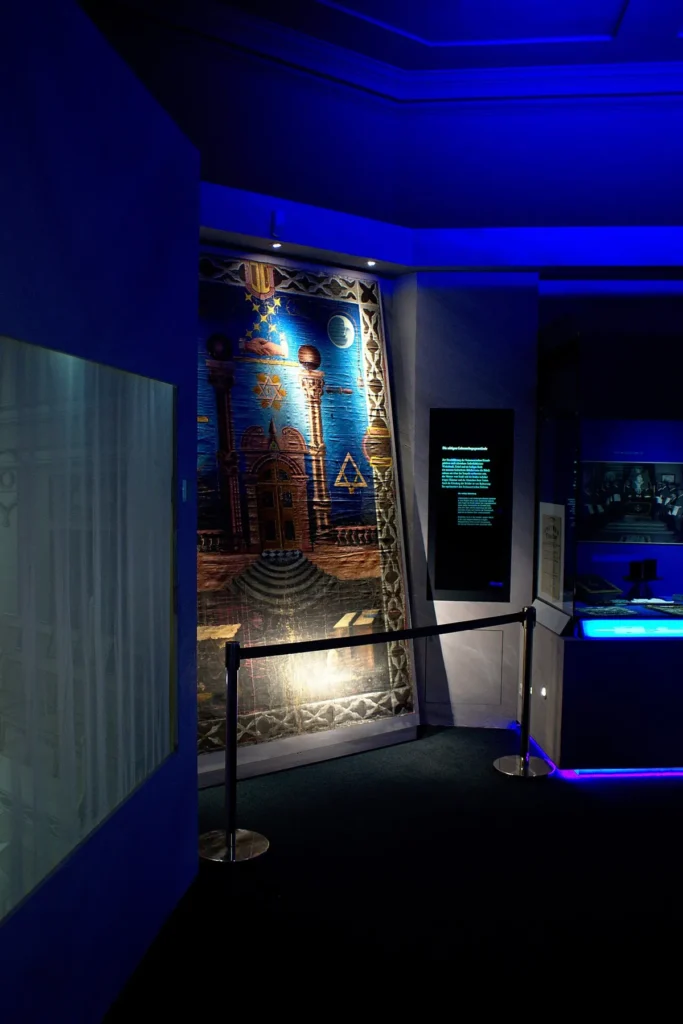 Jachin and Boaz symbolism displayed in Freemasonry Museum tapestry