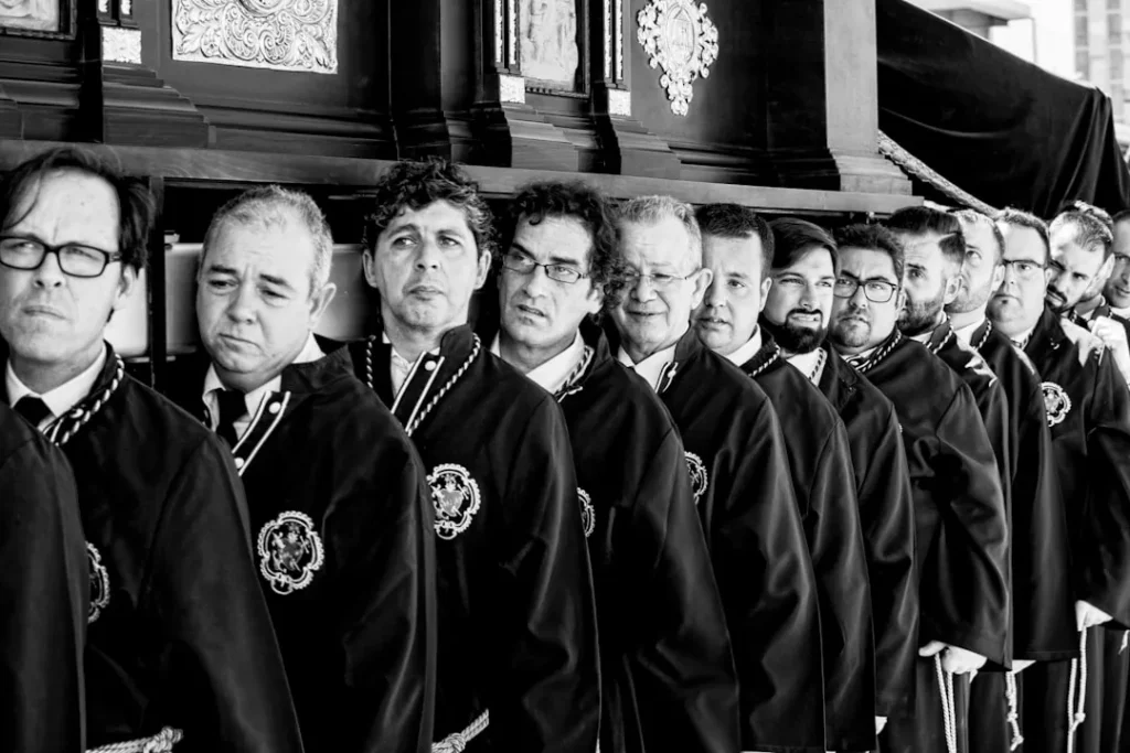 Masonic lodge members in ceremonial regalia during freemasonry degree initiation