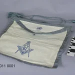 White leather Masonic apron symbolizing initiation and ritual significance