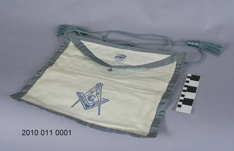 White leather Masonic apron symbolizing initiation and ritual significance