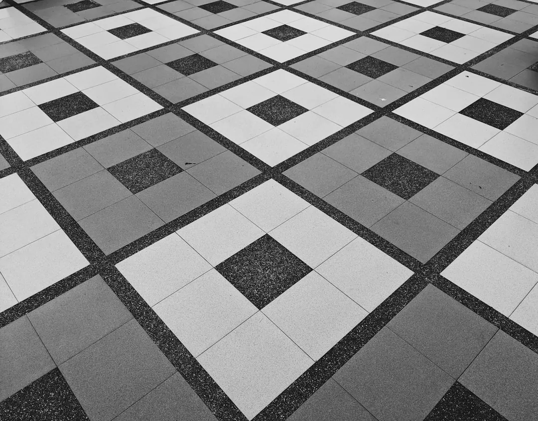 Black and white checkered pattern representing Masonic floor's sacred geometry