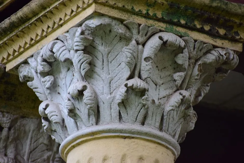 Corinthian column capital represents classical architecture central to Masonic lodge design